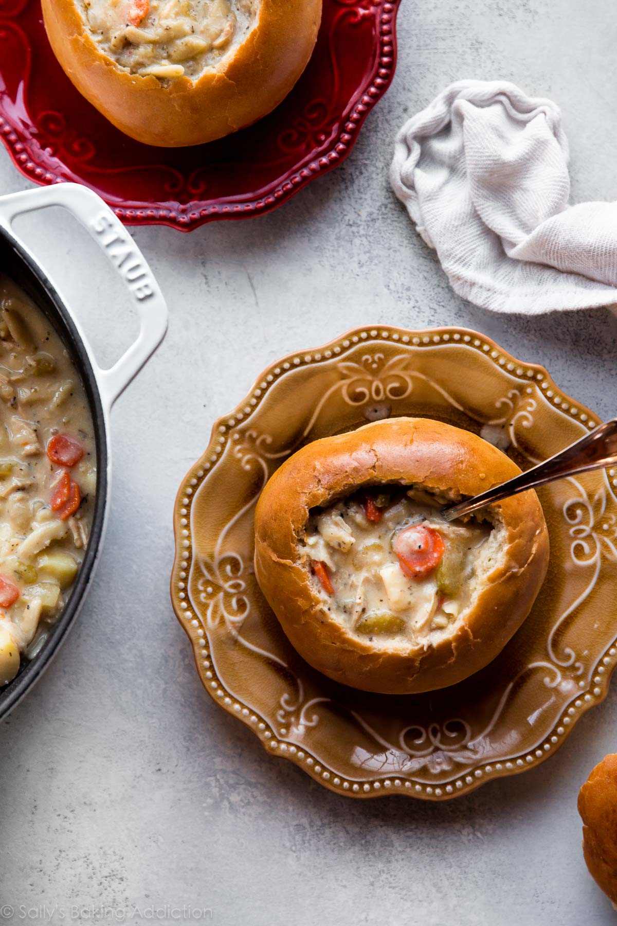 How to make crusty and soft homemade bread bowls with step by step pictures. This is a delicious basic dinner roll recipe you should hold onto! Recipe on sallysbakingaddiction.com